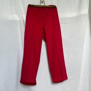 Right red pants, size 10. Cotton 97% and spandex 3%.  Brand “Counterparts”.
